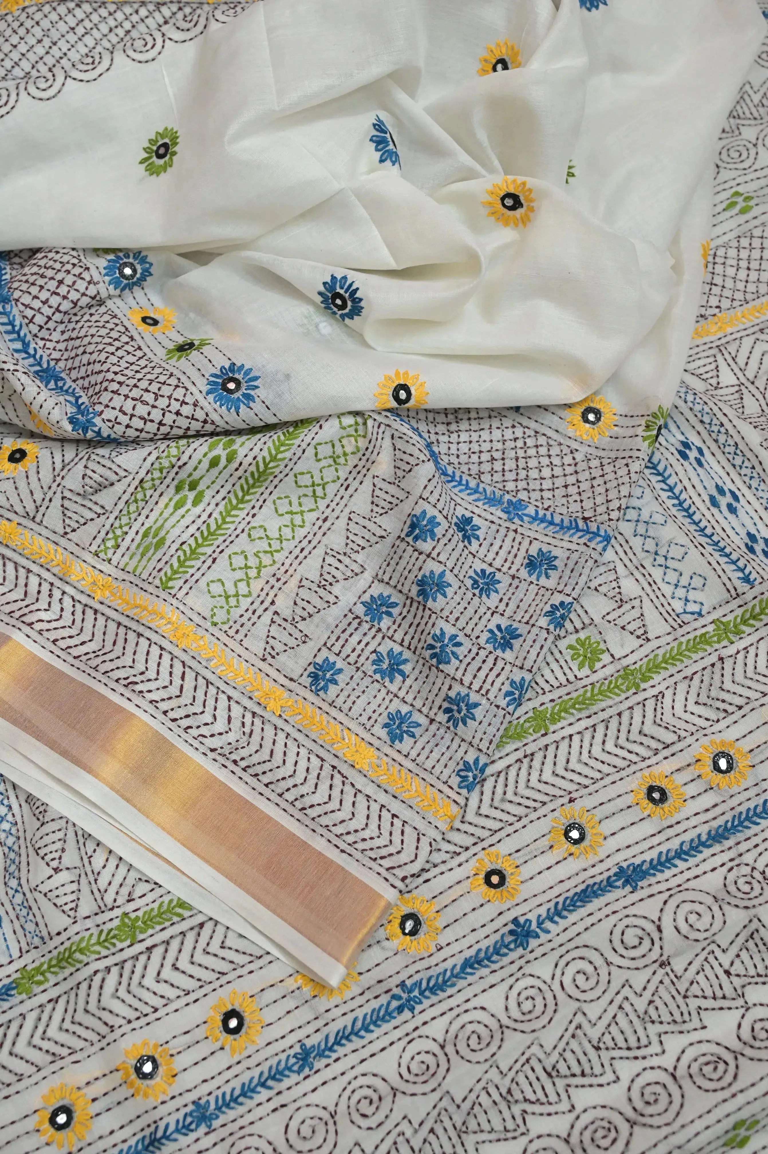 Daisy White Color Kerala Cotton Saree with Hand Lambani and Mirror Work